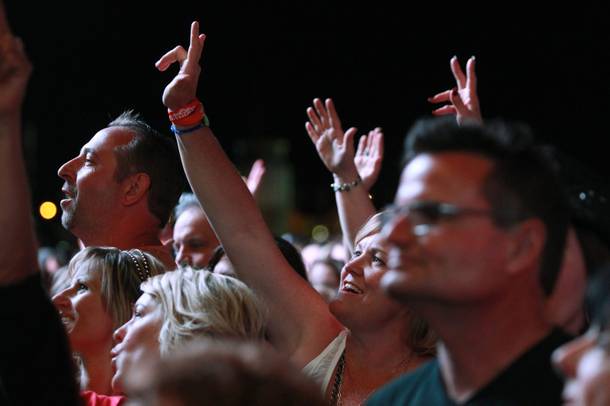 Fans cheer as Chris Young performs during the Academy of Country Music's 
